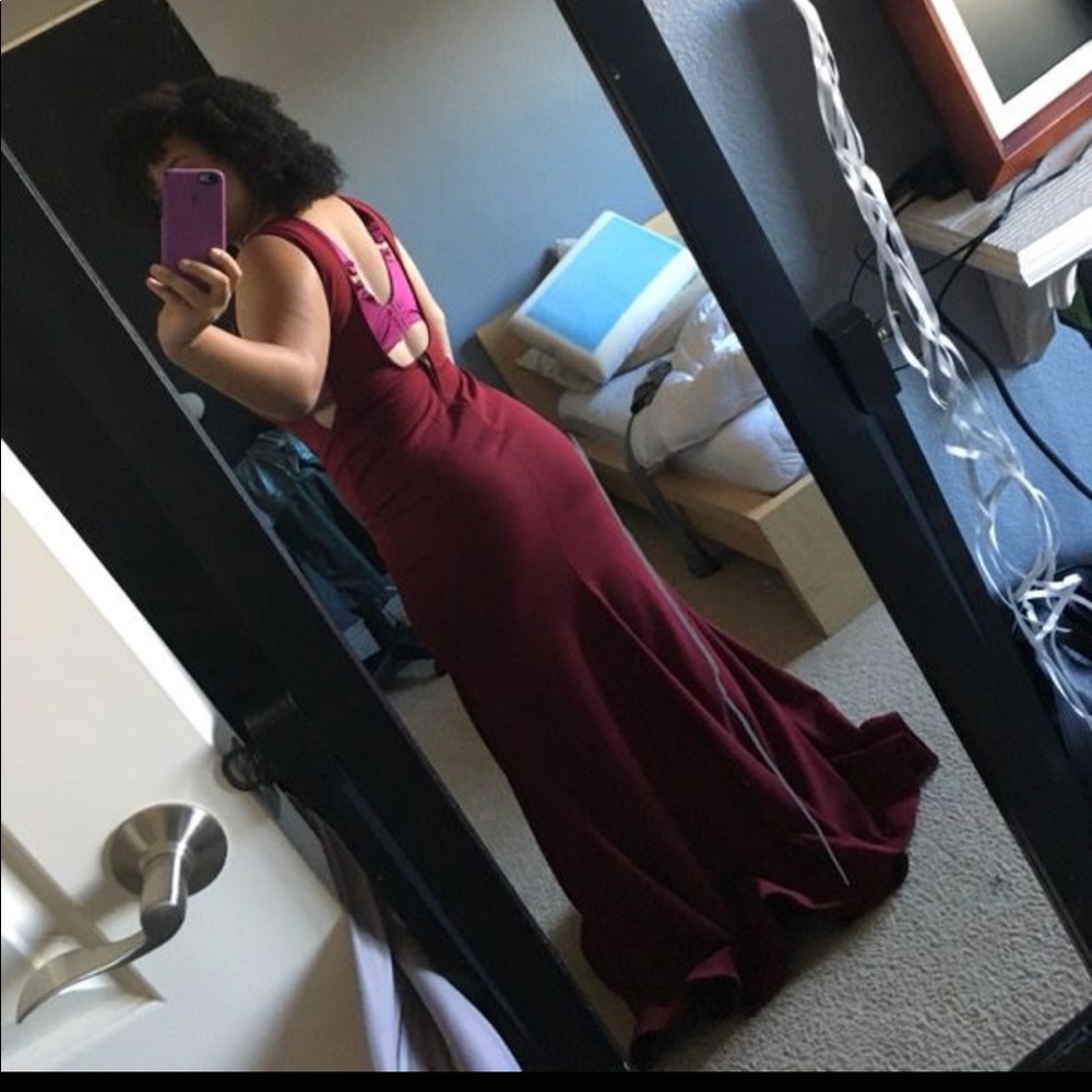 A burgundy prom dress